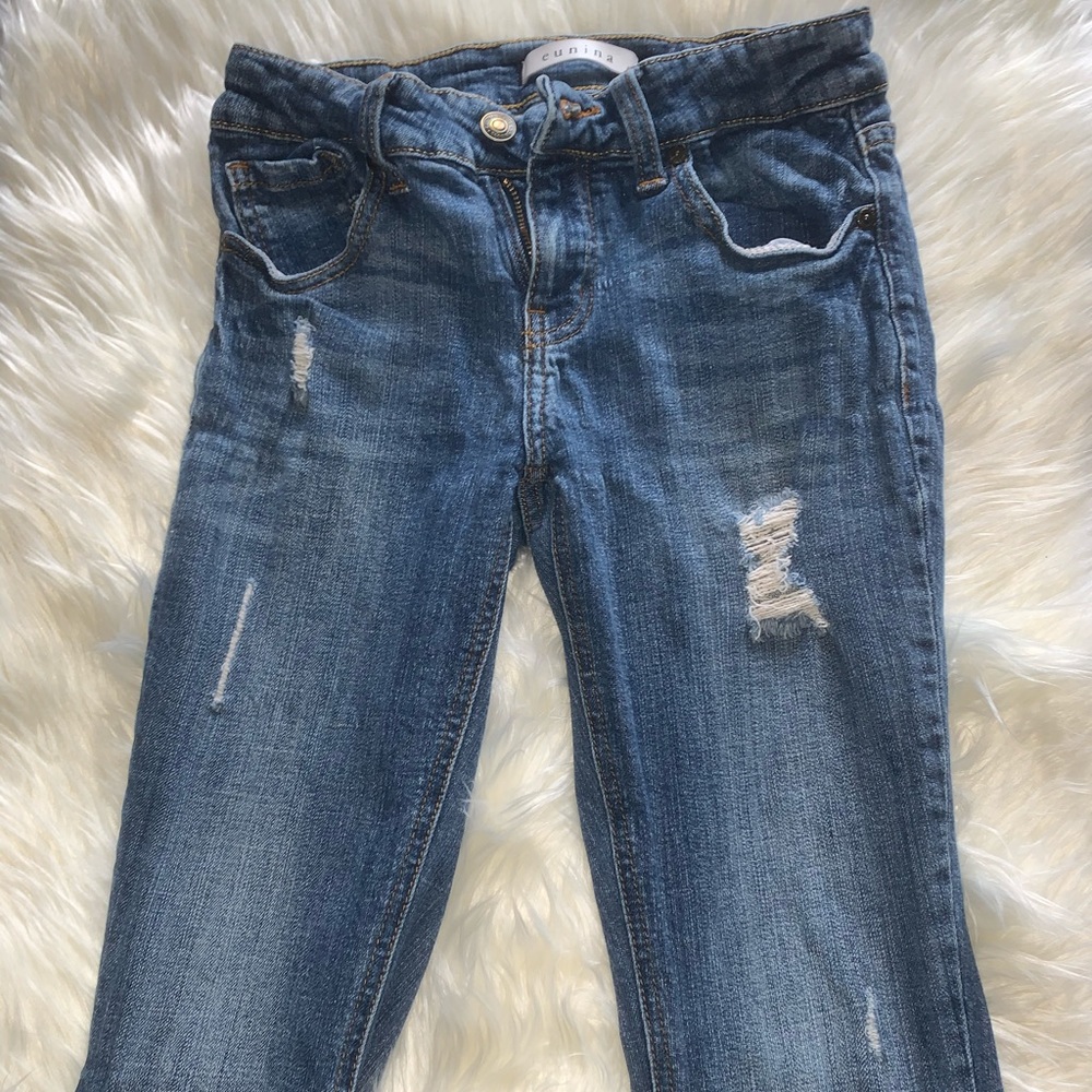 Low rise distressed skinny jeans